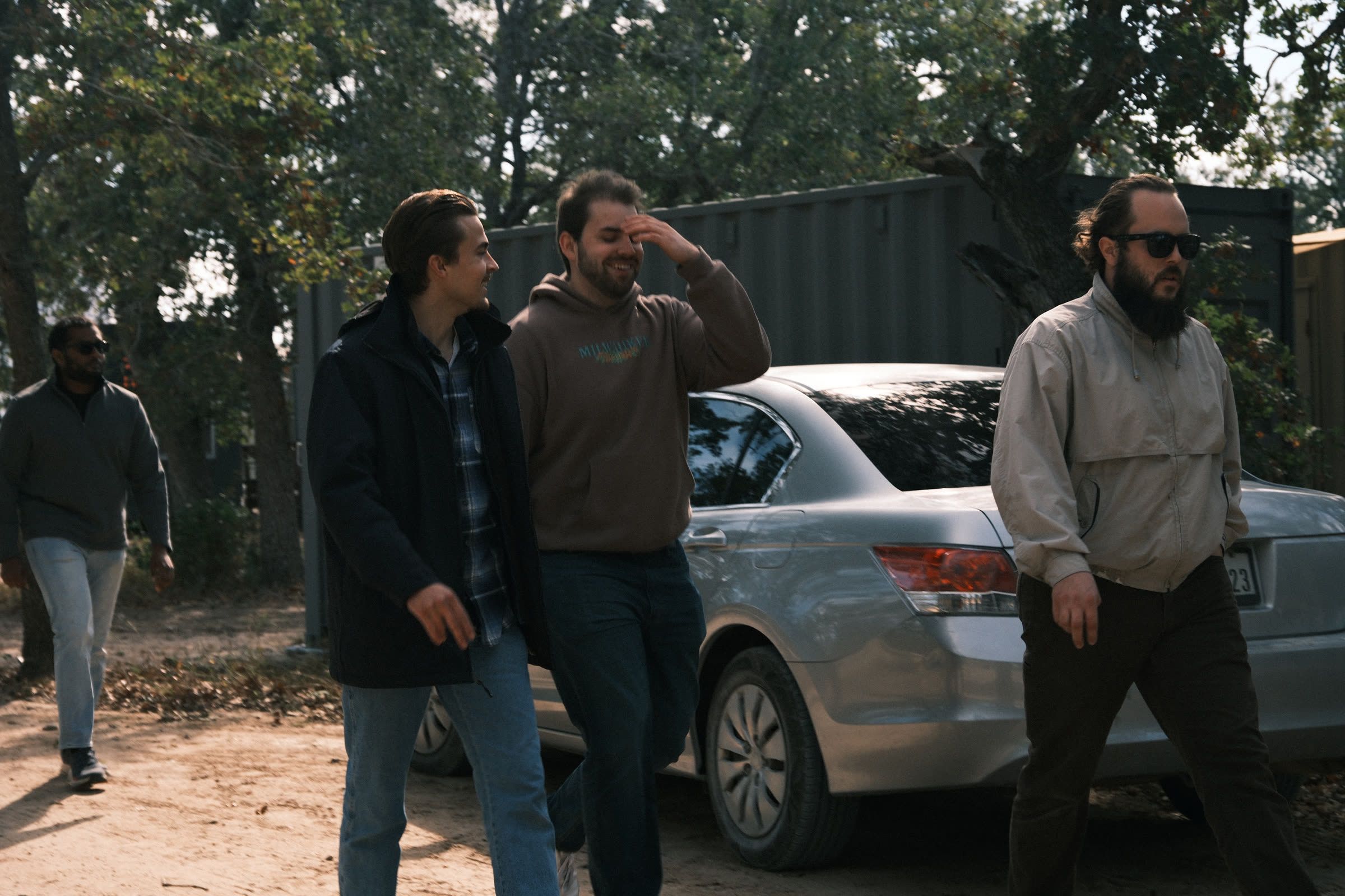 Hunter Manz, Zack Manweiler and Reece Thompson walking the Lockhart site