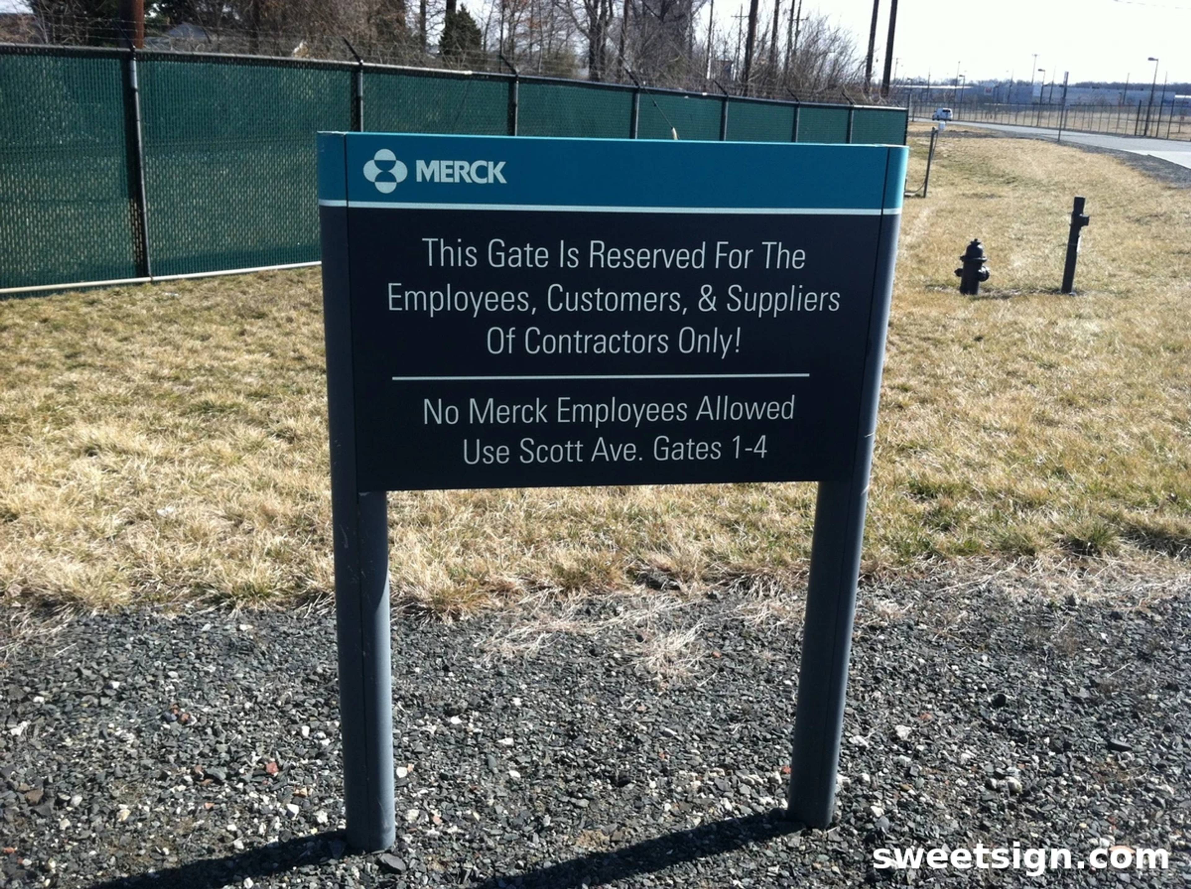 Merck contractor gate entrance regulatory sign