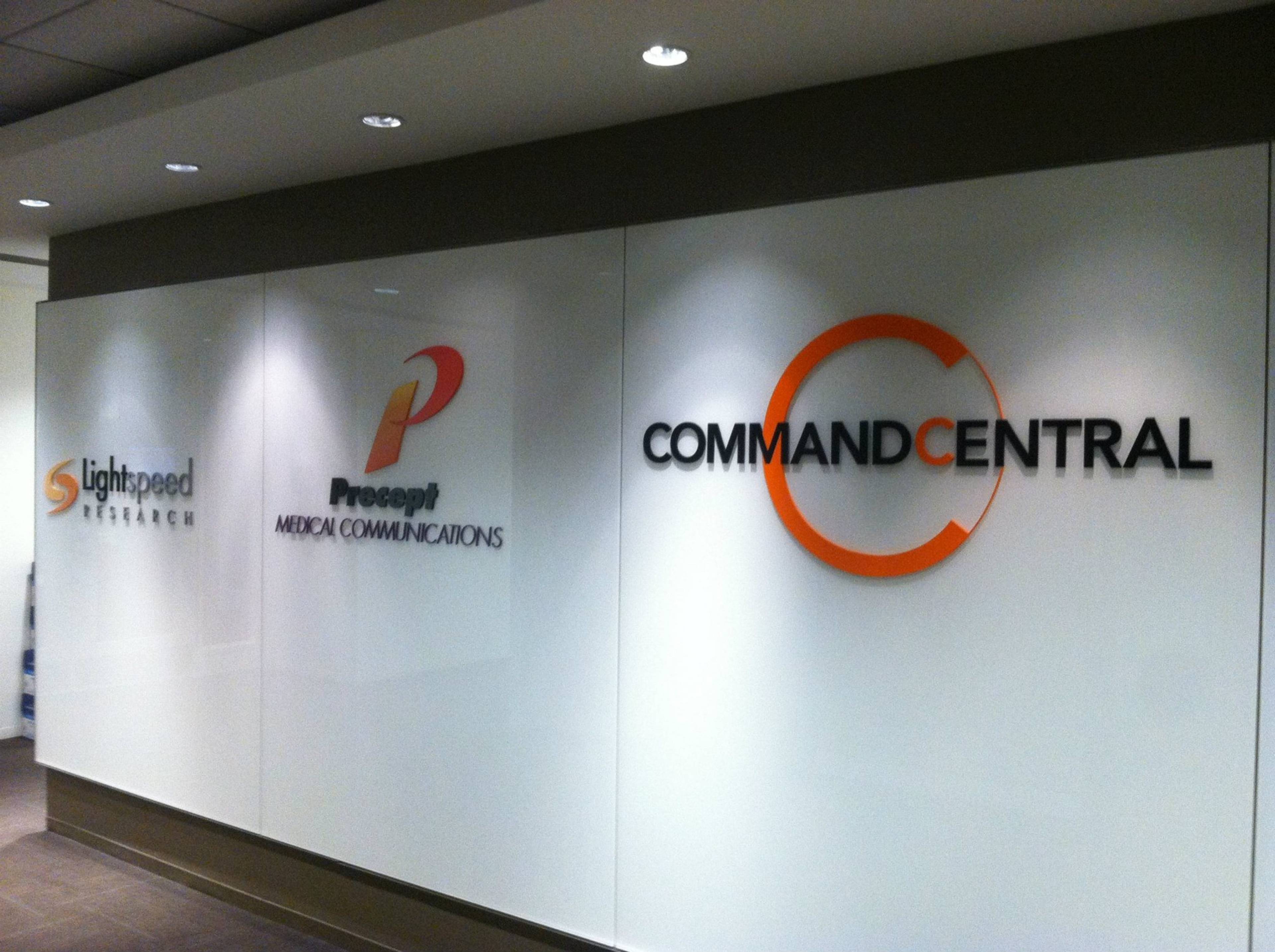 Lobby wall signs for Lightspeed Research, Precept Medical Communications, and Command Central, custom office interior branding