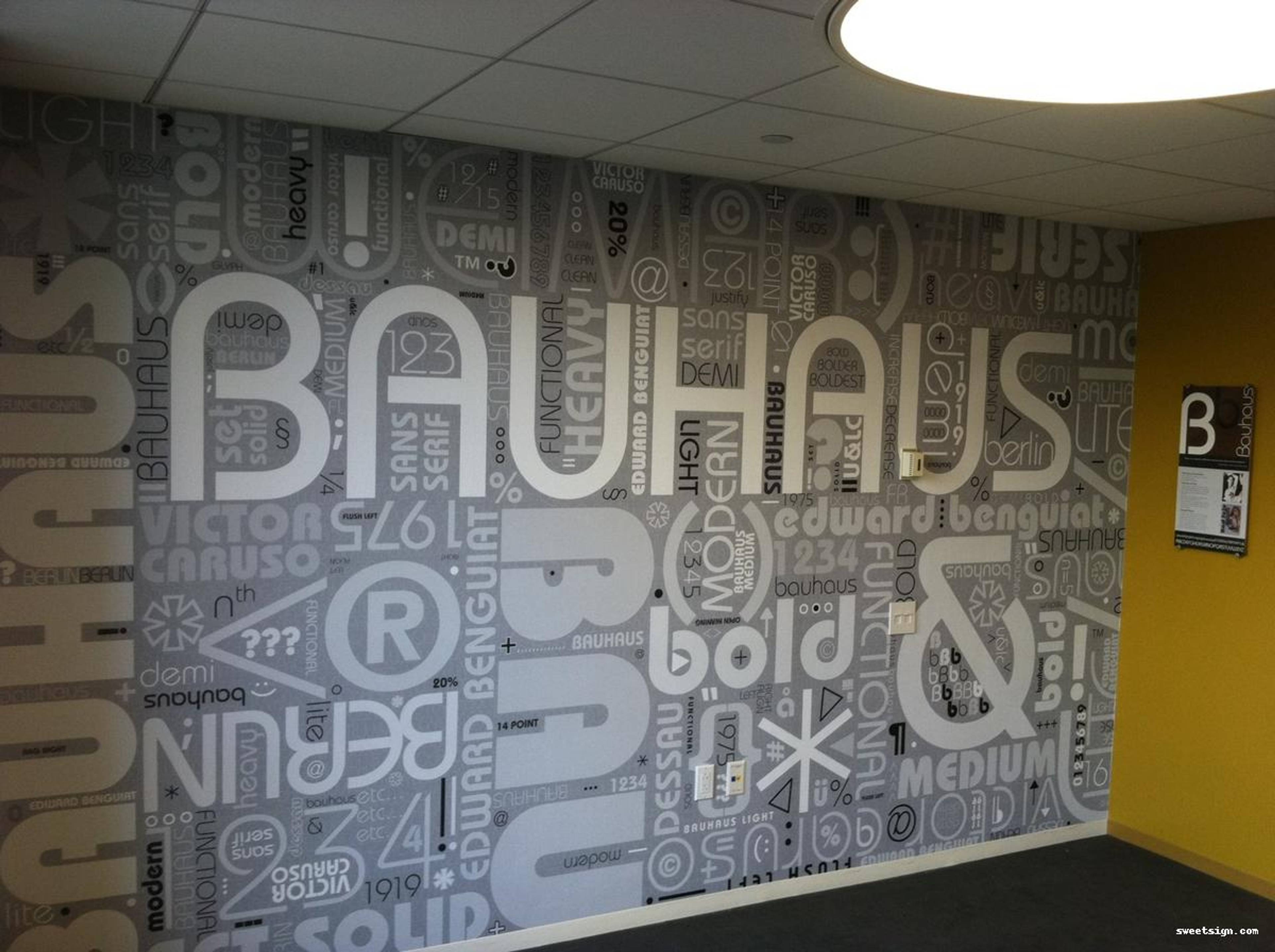 Bauhaus typography feature wall mural with modern design patterns