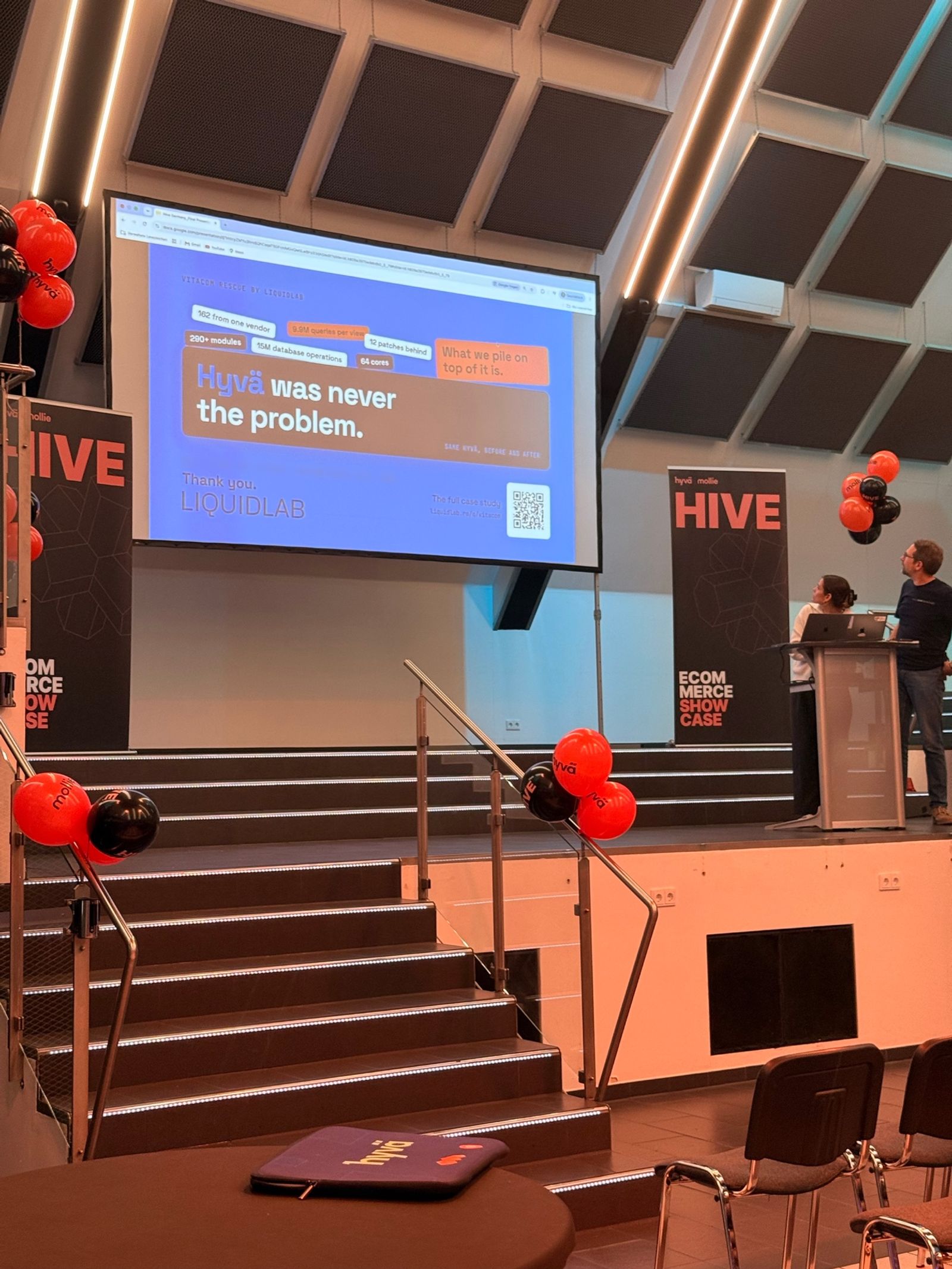 Ultimul slide al prezentării LIQUIDLAB pe ecranul mare de la HIVE Germany 2026, cu mesajul Hyvä was never the problem (Hyvä nu a fost niciodată problema).