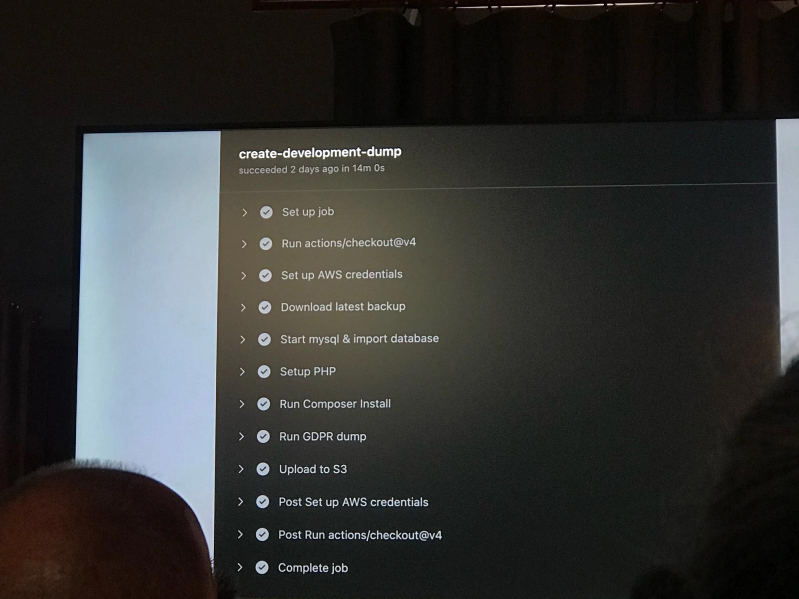 Slide cu jobul GitHub Actions „create-development-dump”: 12 pași, de la backup la dump GDPR și upload în S3, terminat în 14 minute.