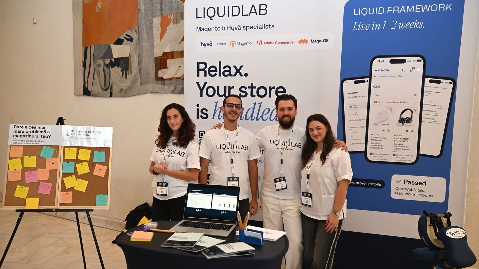 The LIQUIDLAB team at the GPeC SUMMIT 2026 stand, in front of the Relax. Your store is handled. banner, next to the sticky-note board and the massage chair.