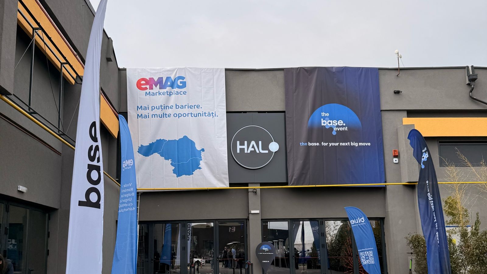 The HALO Events Center entrance with eMAG Marketplace and "the base. for your next big move" banners on 1 April 2026.