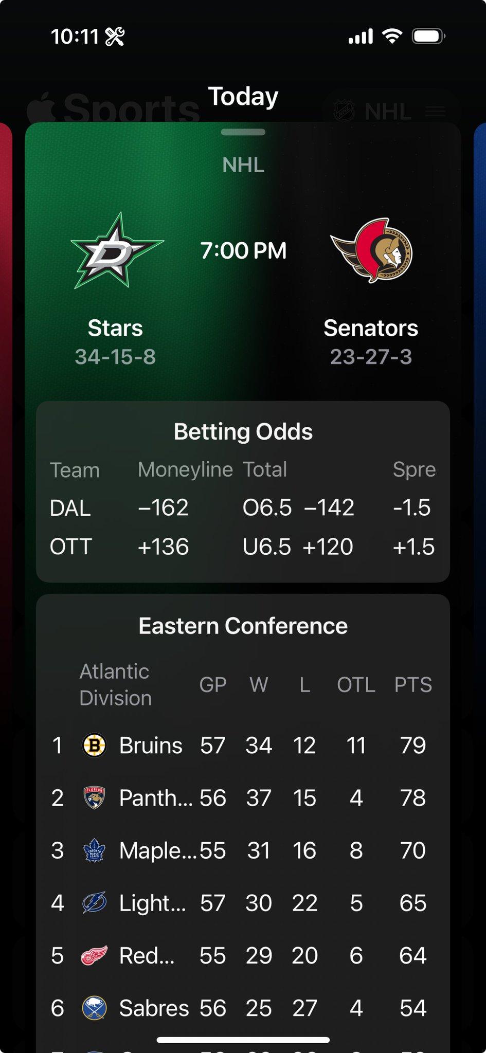 The same table shown in the previous image, but the fonts are about 30 percent larger. Team names in the division standings are truncated, but the columns remain aligned. Table headers wrap onto additional lines instead of truncating.