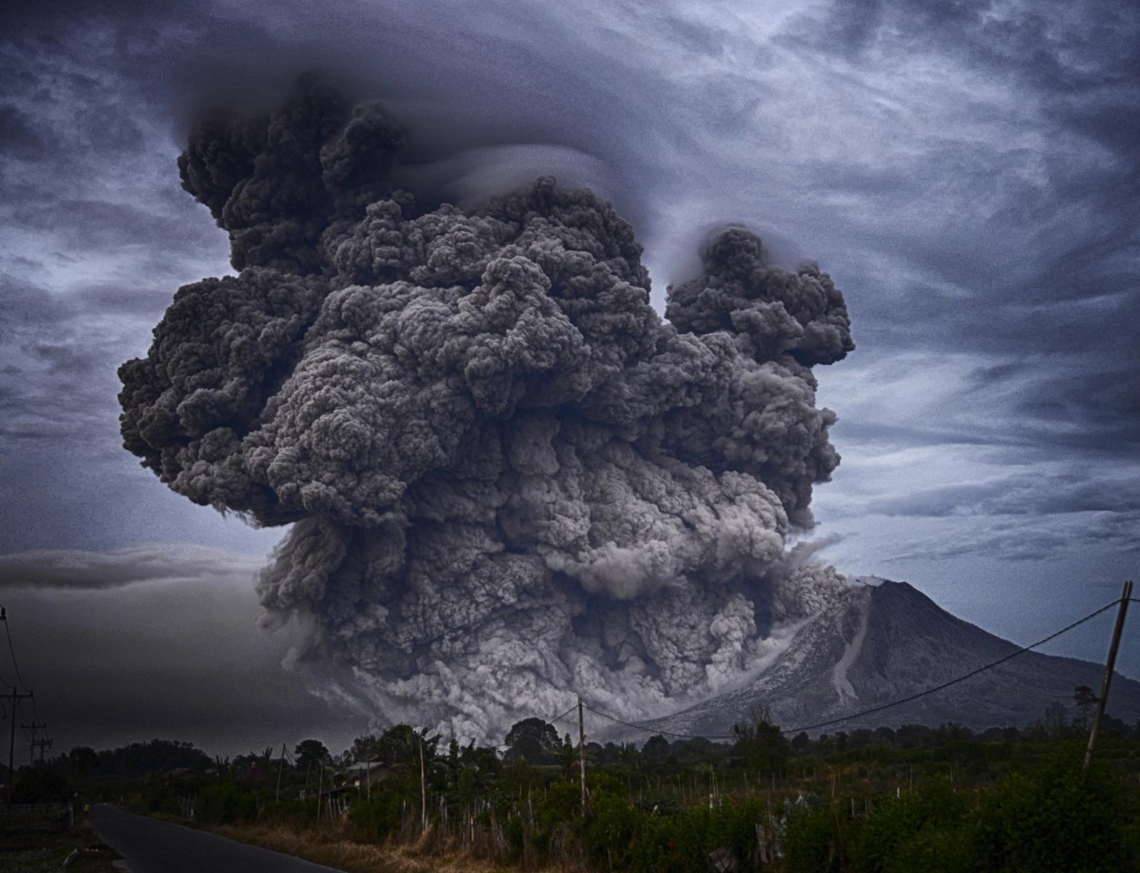 A volcano erupting.