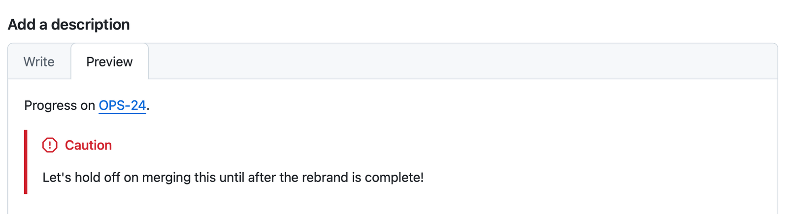 An example of a callout in a GitHub pull request. The callout is red, with a "Caution" label, and says, "Let's hold off on merging this until after t he rebrand is complete!"