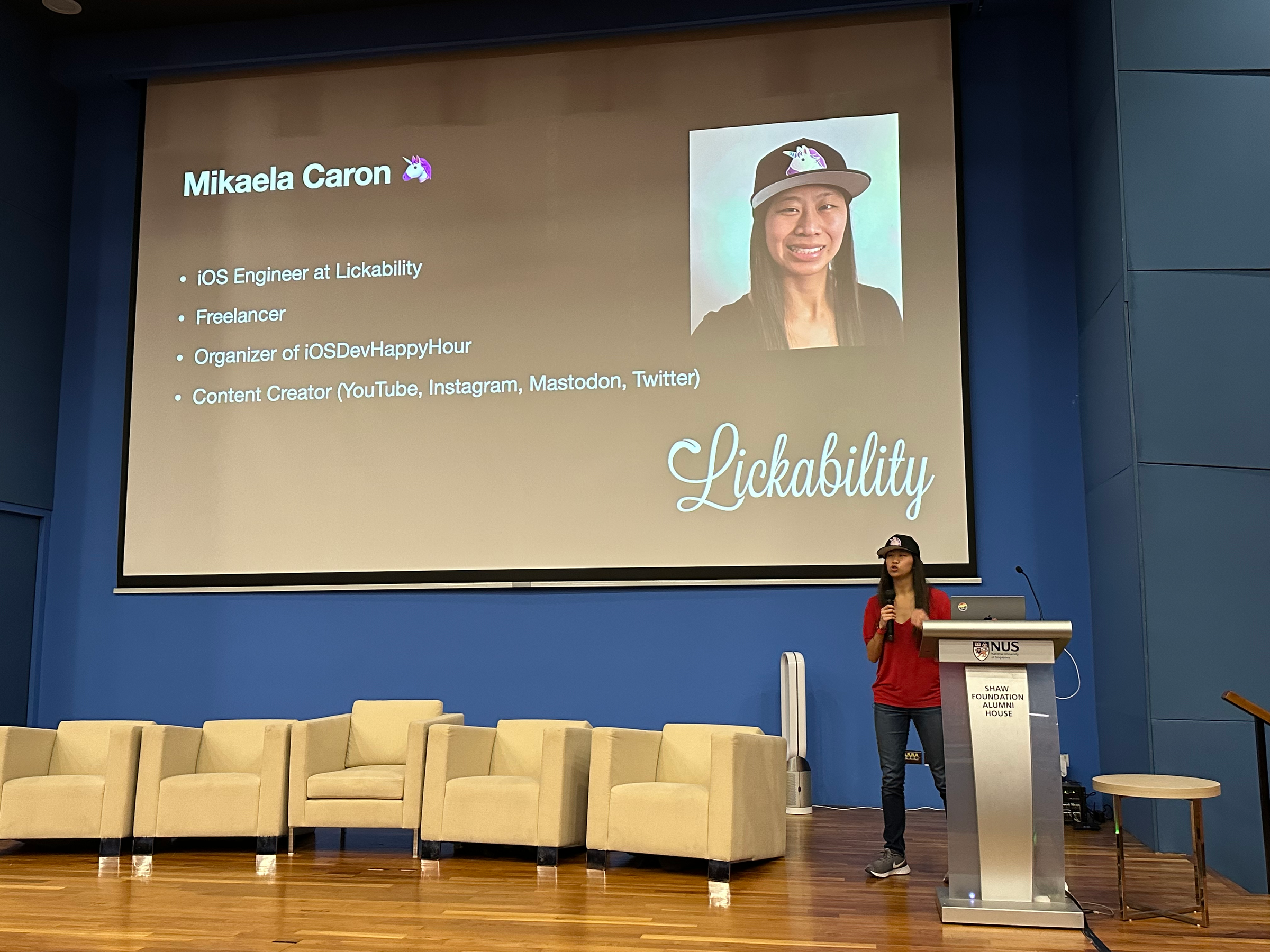 Mikaela giving a talk at iOS Conf SG