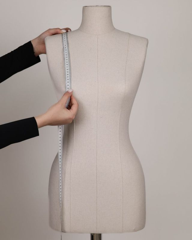 SHOULDER TO THE TIP OF THE BREAST