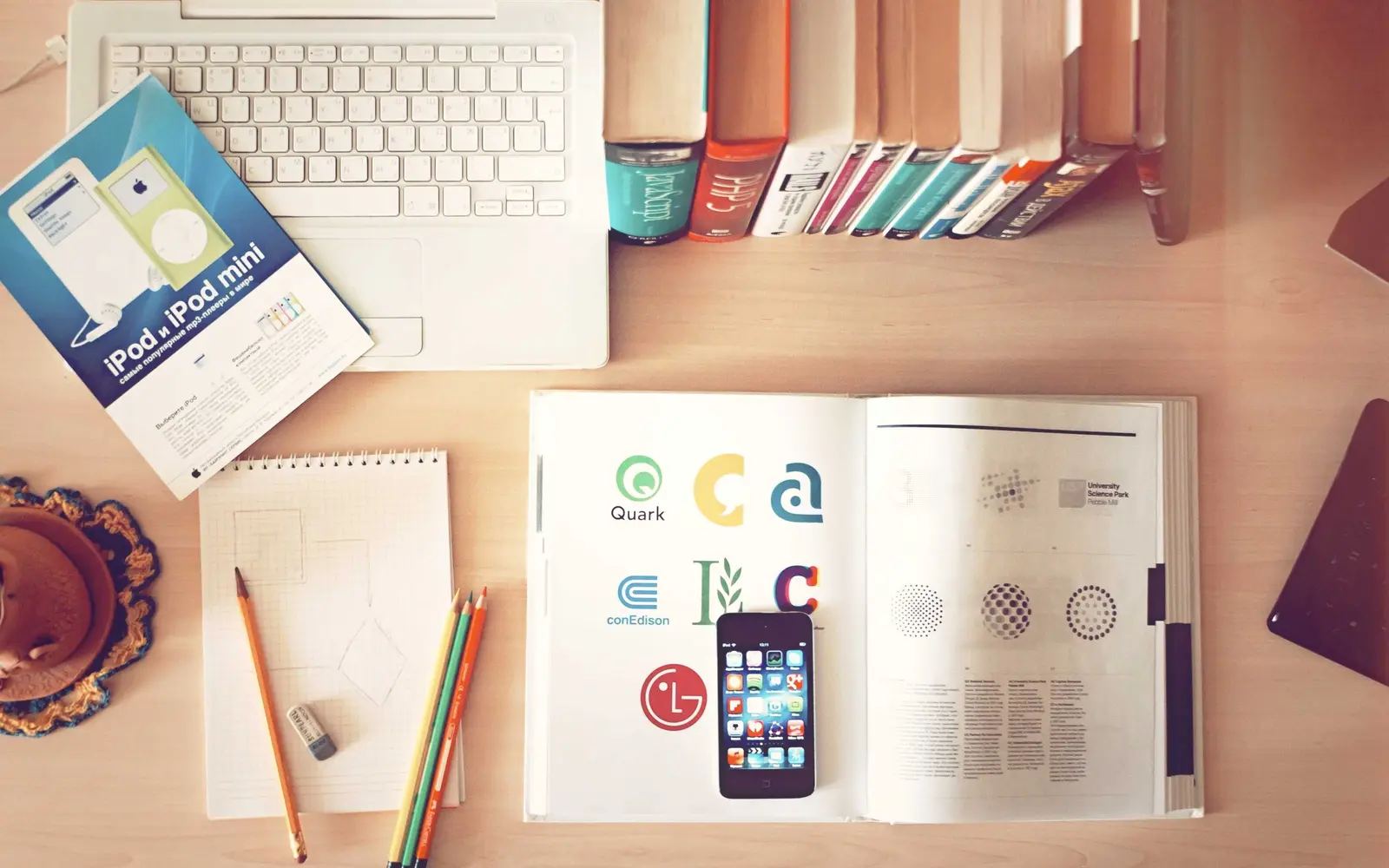 Placeholder: a desk with notes and devices