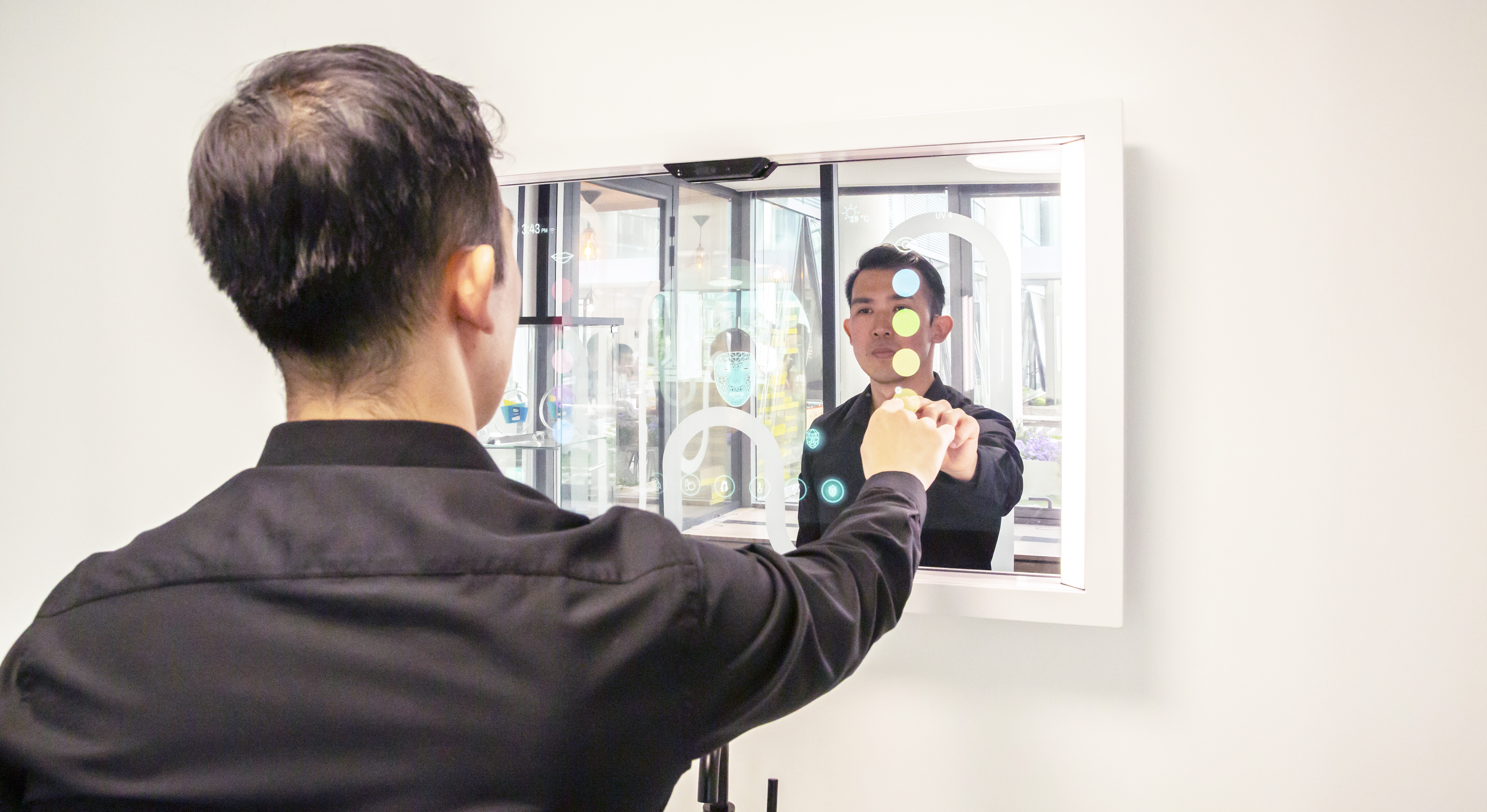 Man using touchless AIoT mirror