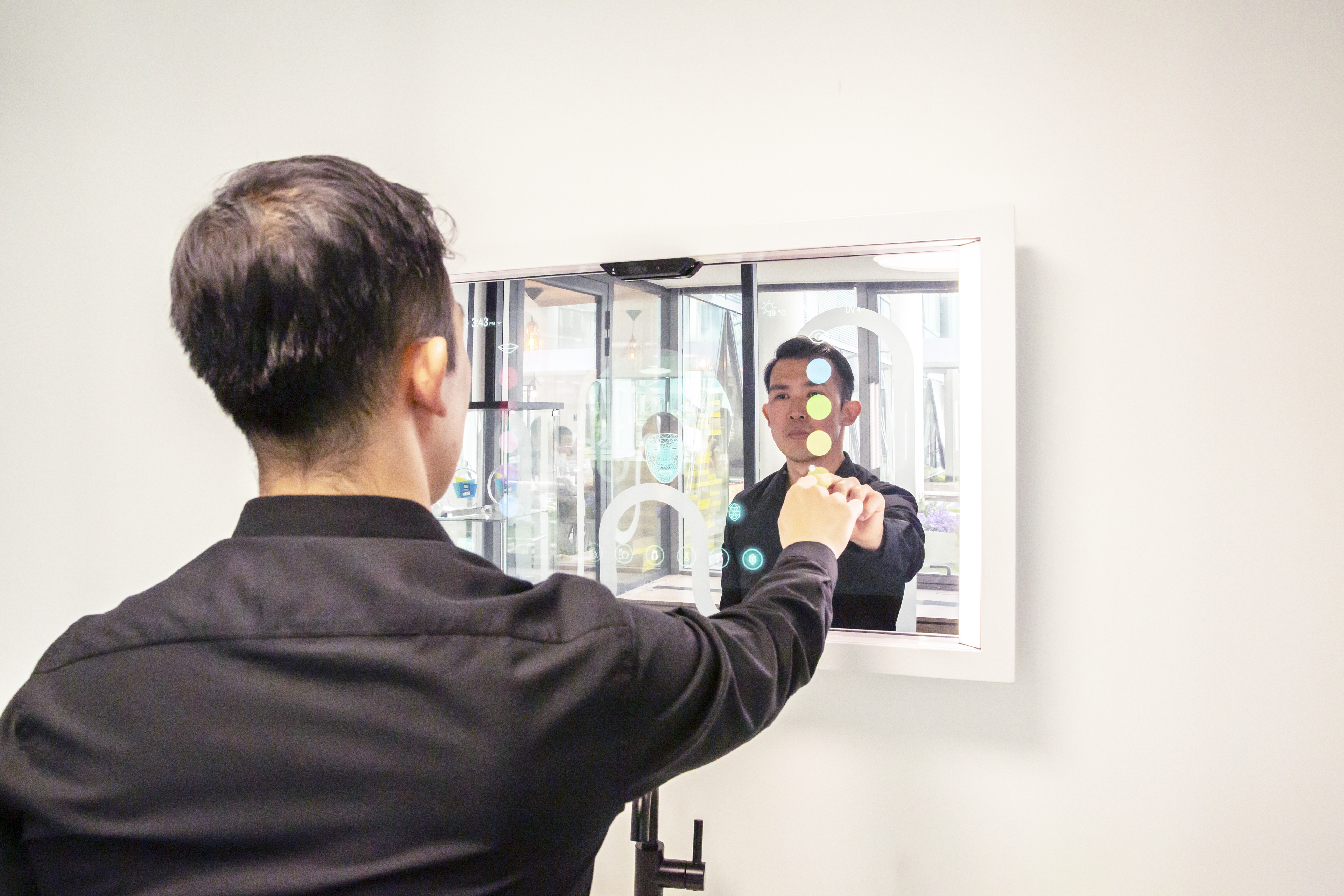 Man using smart mirror