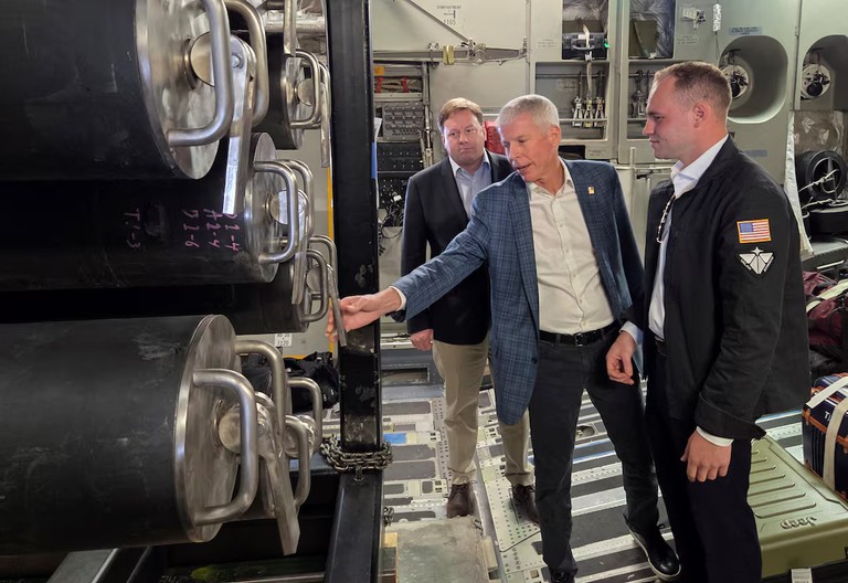 US Secretary of Energy Chris Wright examining a microreactor