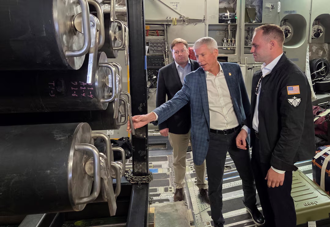 US Secretary of Energy Chris Wright examining a microreactor