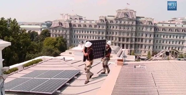 Image of solar panels being installed on the White House
