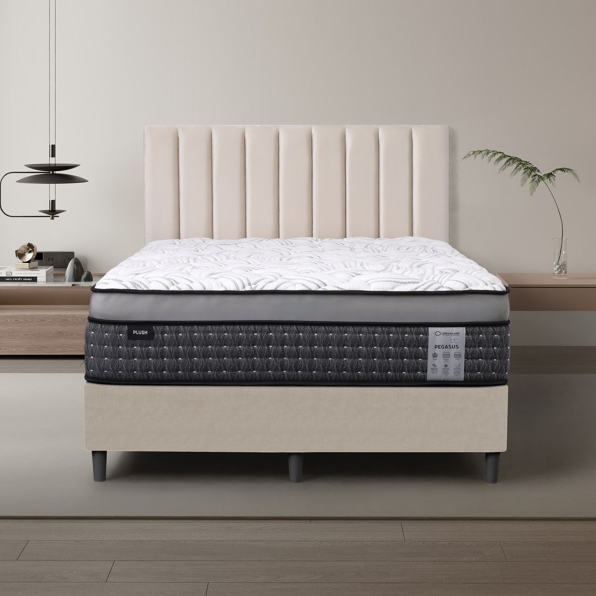 Dreamland Pegasus Plush mattress, queen size, shown front-on in a styled bedroom.