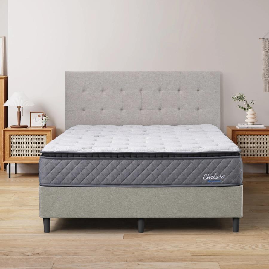 Dreamland Chelsea mattress, queen size, shown front-on in a styled bedroom.