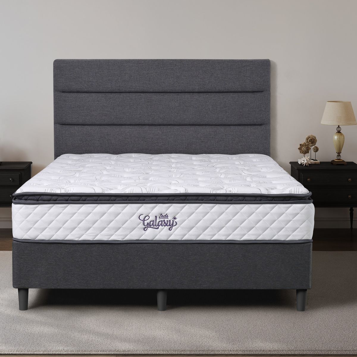 Dreamland Galaxy mattress, queen size, shown front-on in a styled bedroom.