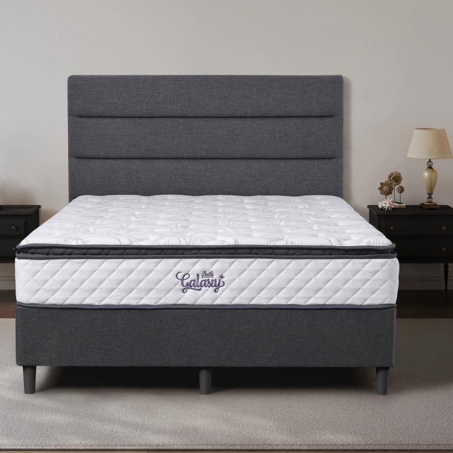 Dreamland Galaxy mattress, queen size, shown front-on in a styled bedroom.