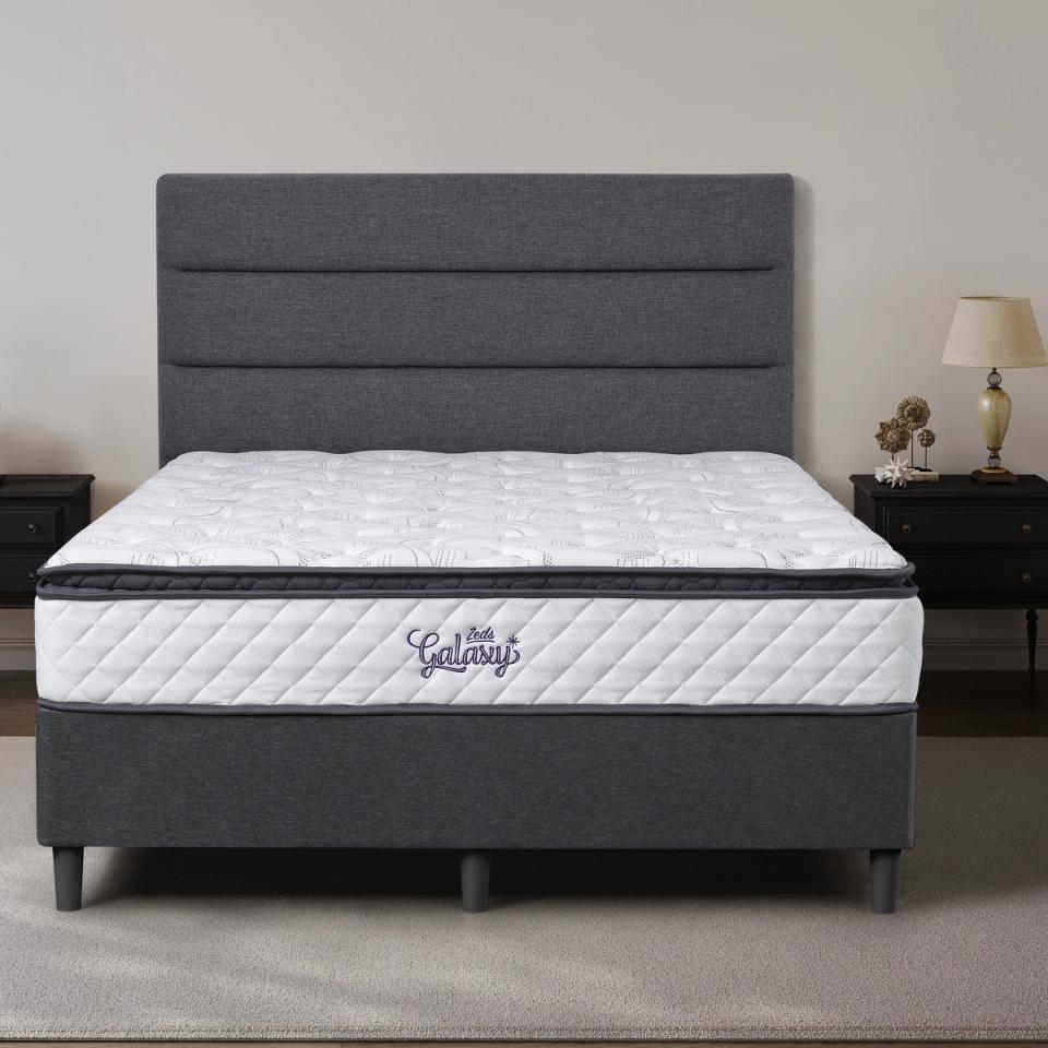 Dreamland Galaxy mattress, queen size, shown front-on in a styled bedroom.
