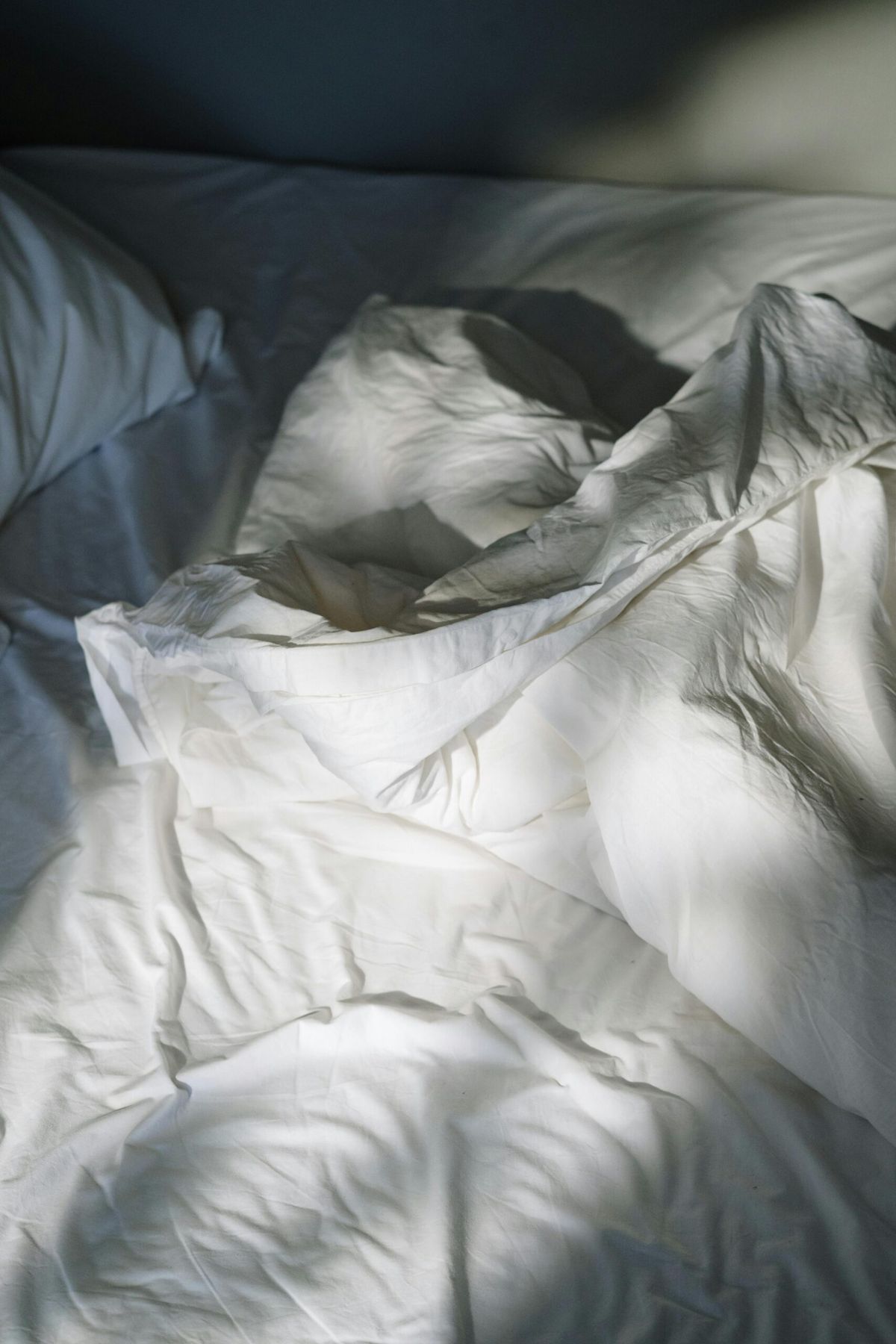 A mattress being cleaned, illustrating bed hygiene and dust mites