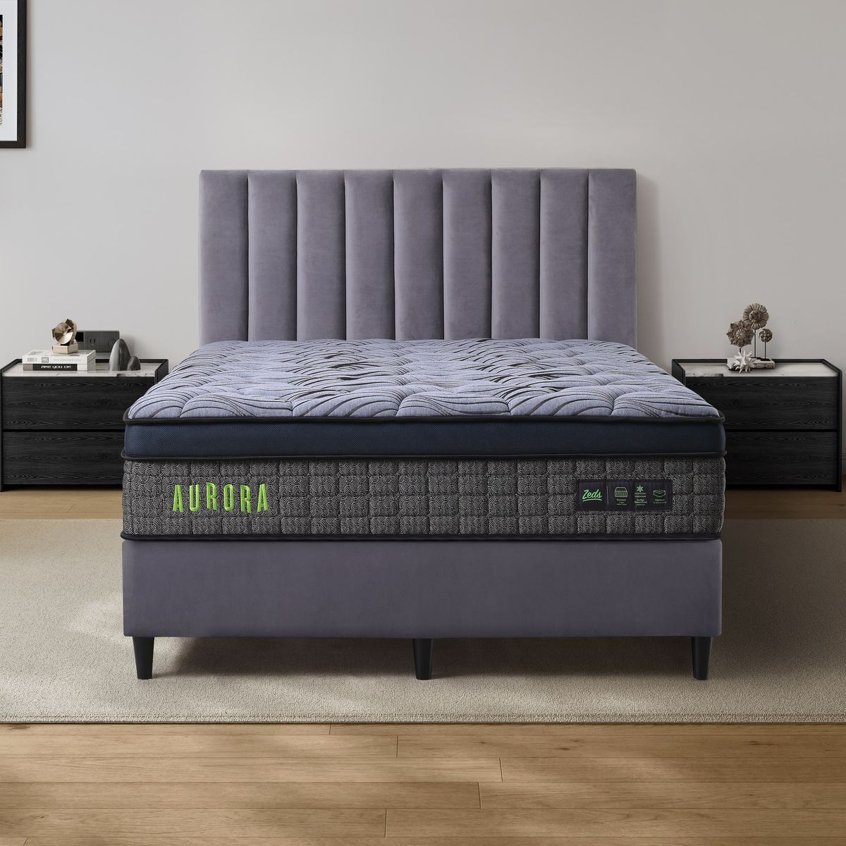 Dreamland Aurora mattress, queen size, shown front-on in a styled bedroom.