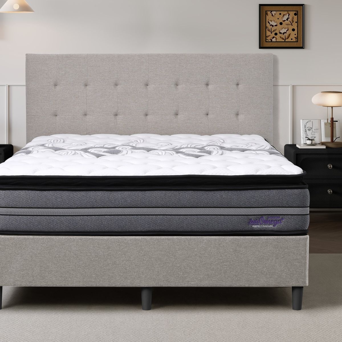 Dreamland Omega Medium mattress, queen size, shown front-on in a styled bedroom.