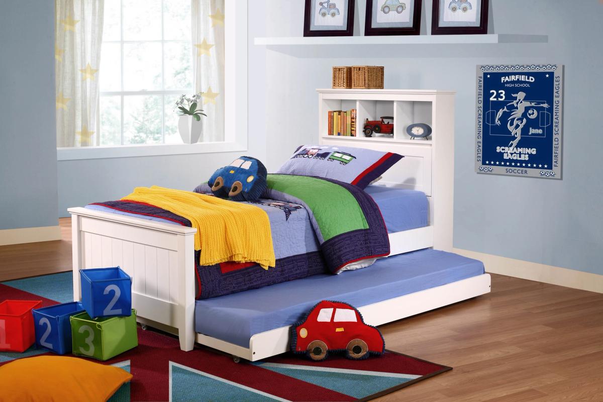 White Jack bed frame with bookcase headboard and pull-out trundle in a kids bedroom