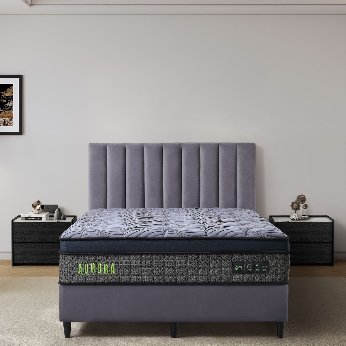 Dreamland Aurora mattress, queen size, shown front-on in a styled bedroom.