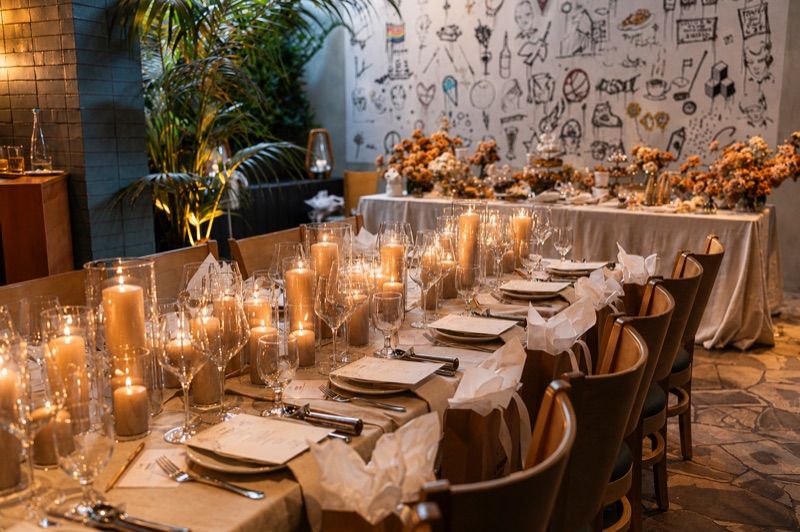 A private event table dressed with candles and florals at Craig's