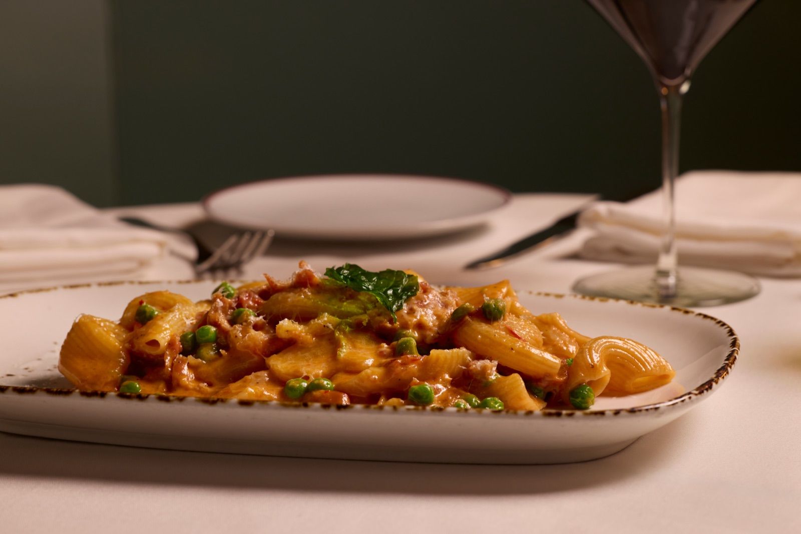 A pasta dish tossed with parmesan