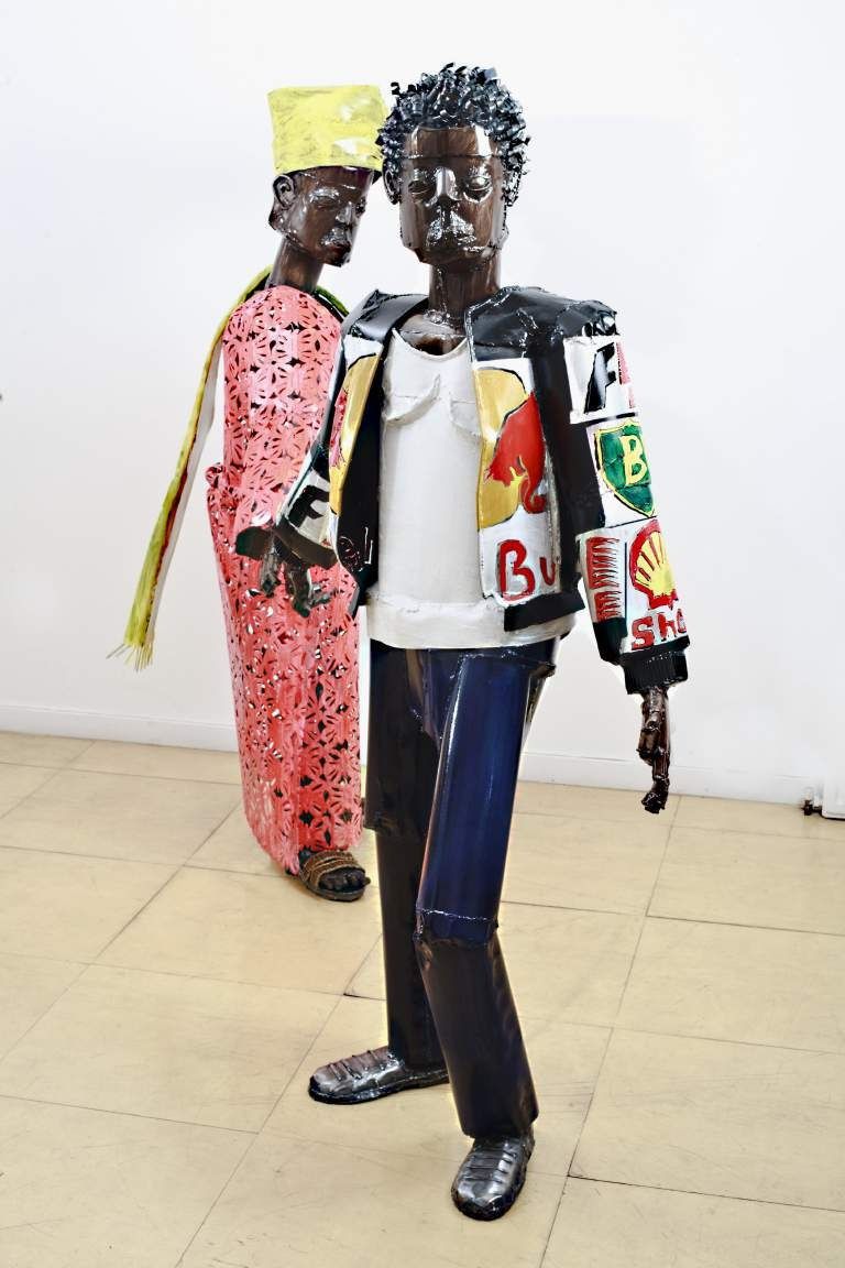 Sokari Douglas Camp, Material Salsa, 2011. Steel and acrylic paint: a life-size man and woman in patterned clothing standing side by side.