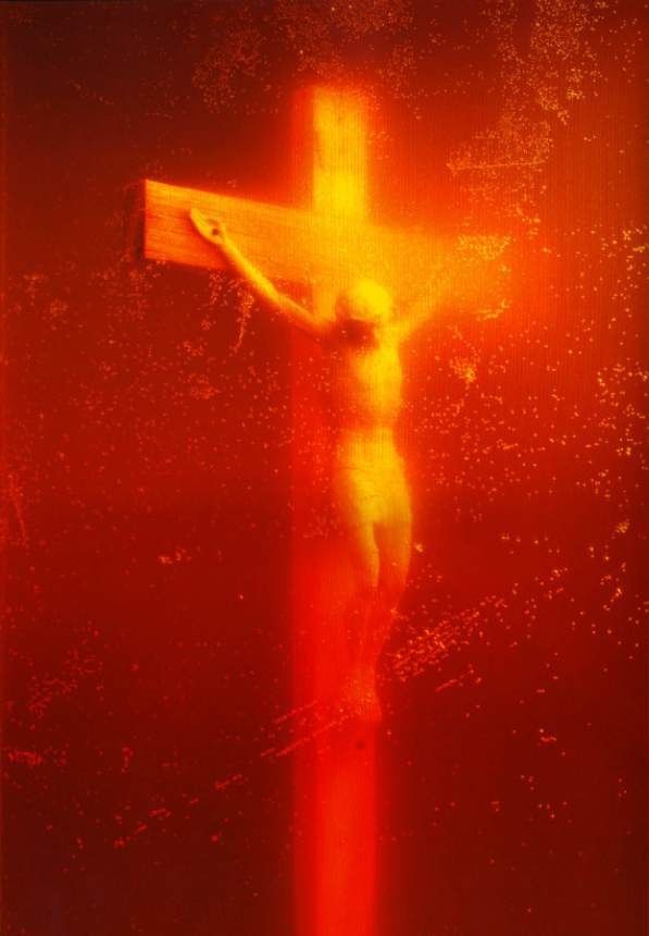 Andres Serrano, Piss Christ, 1987. Cibachrome print: a small crucifix suspended in glowing orange-red light.