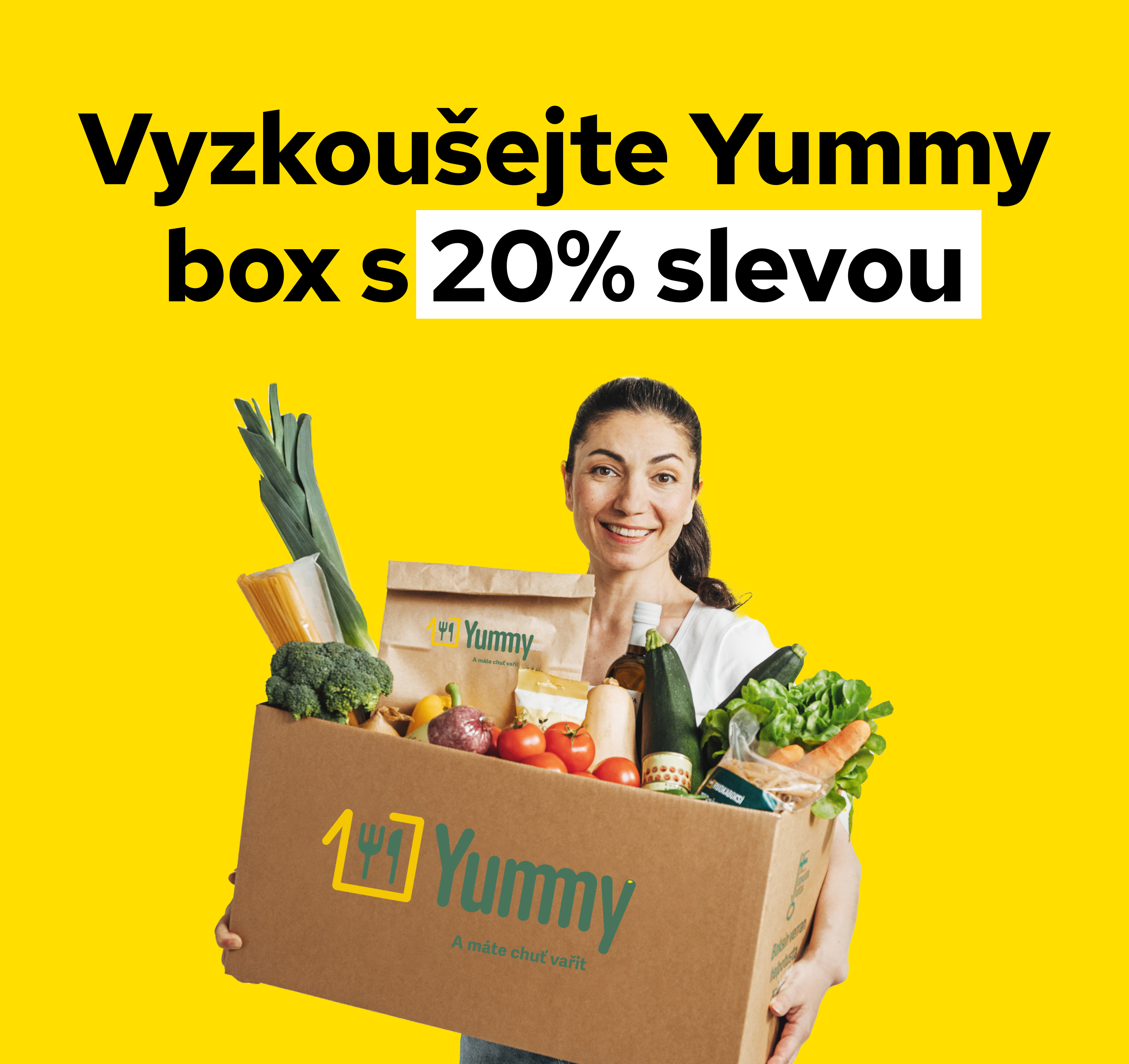 A smiling woman holding a Yummy box full of food with the text “Try Yummy with a 20% discount”.