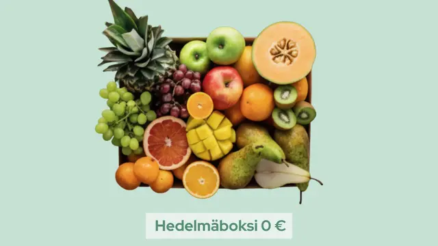 Hedelmäboksi täynnä herkullisia hedelmiä, anananasta, päärynää, melonia, mangona, kiiviä.