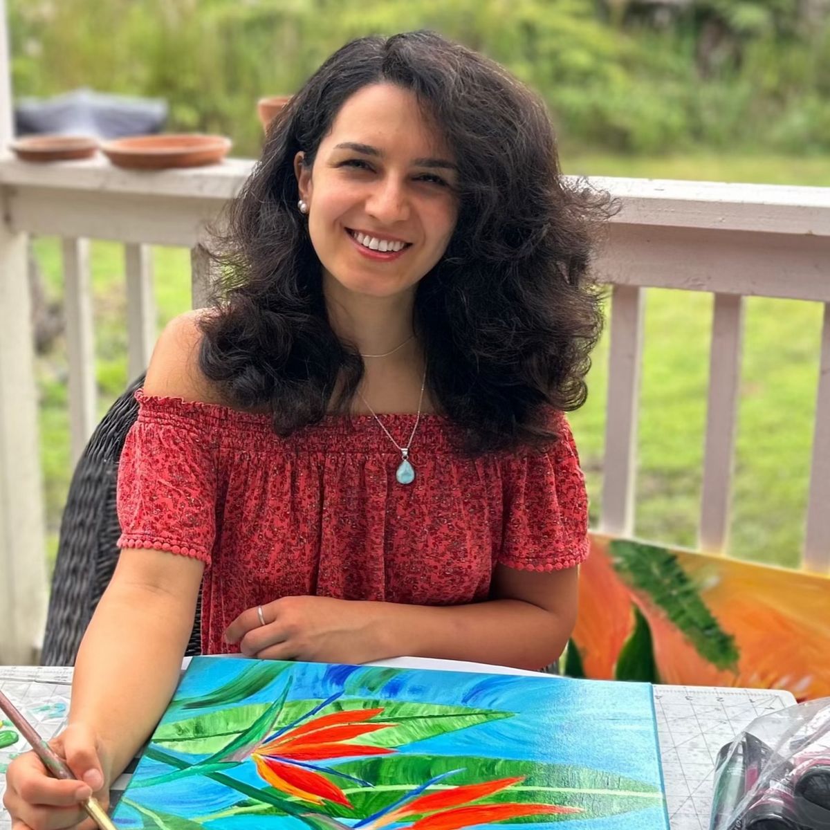 Sahar painting in the studio