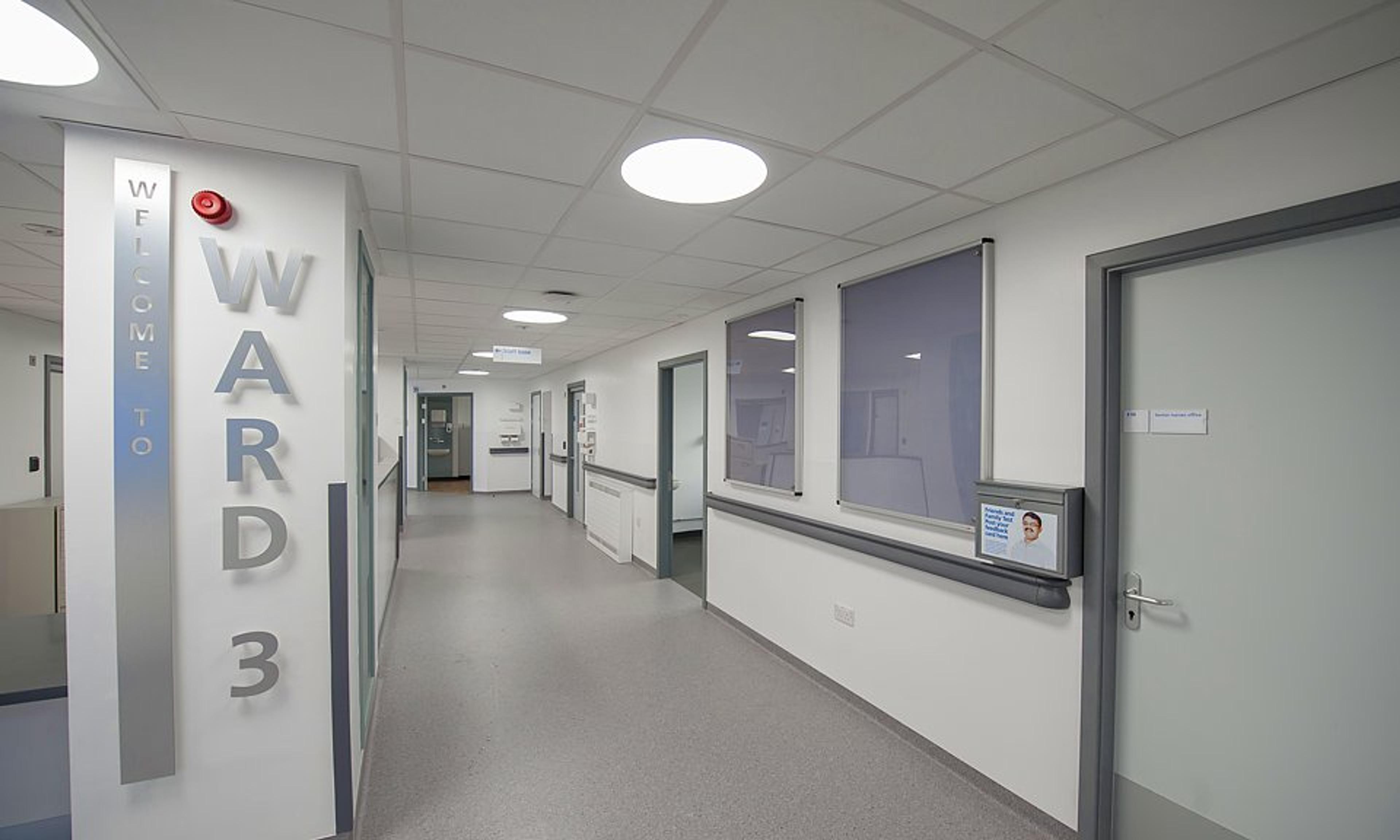 An empty hospital ward - ward three at Weston Park Cancer Centre - is pictured with its lights on.