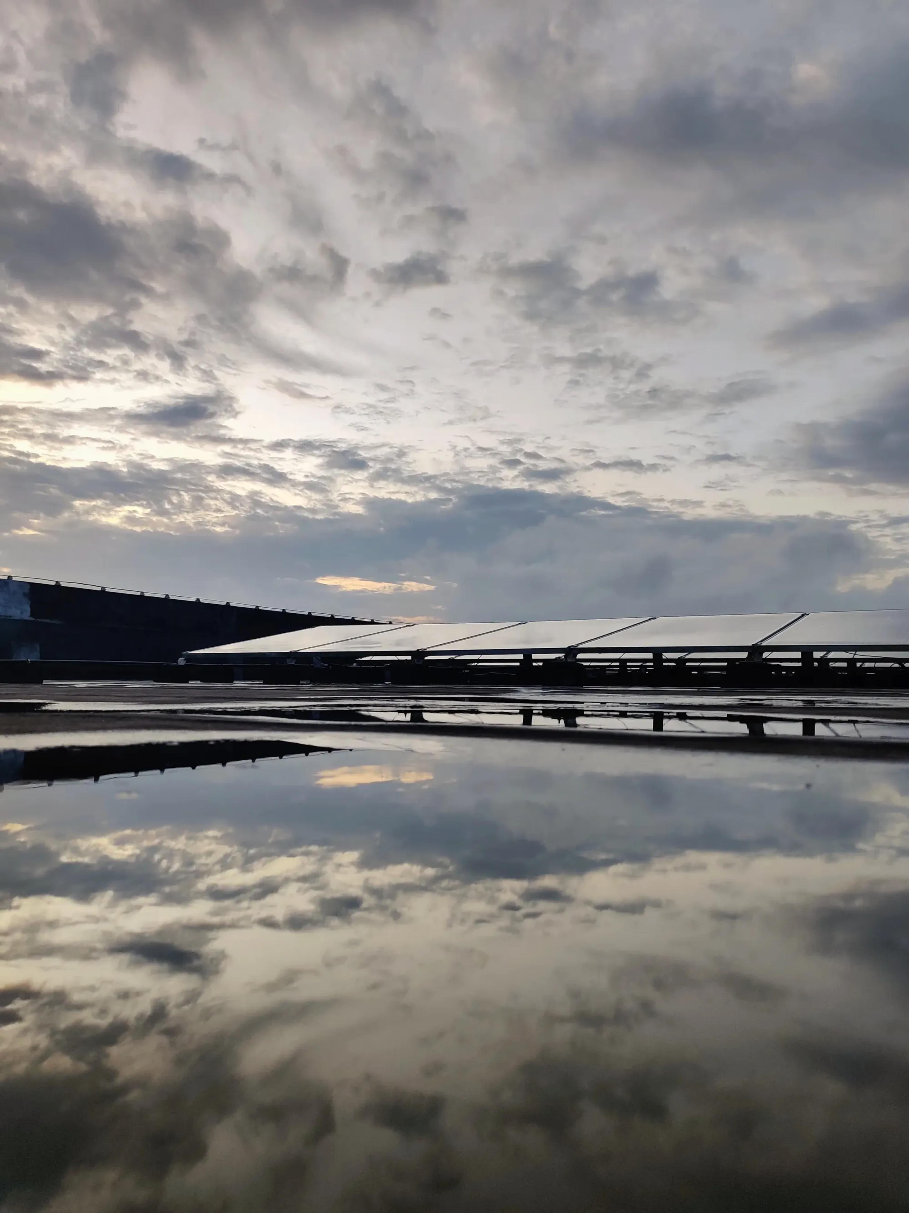 Solar panel system under a cloudy sky