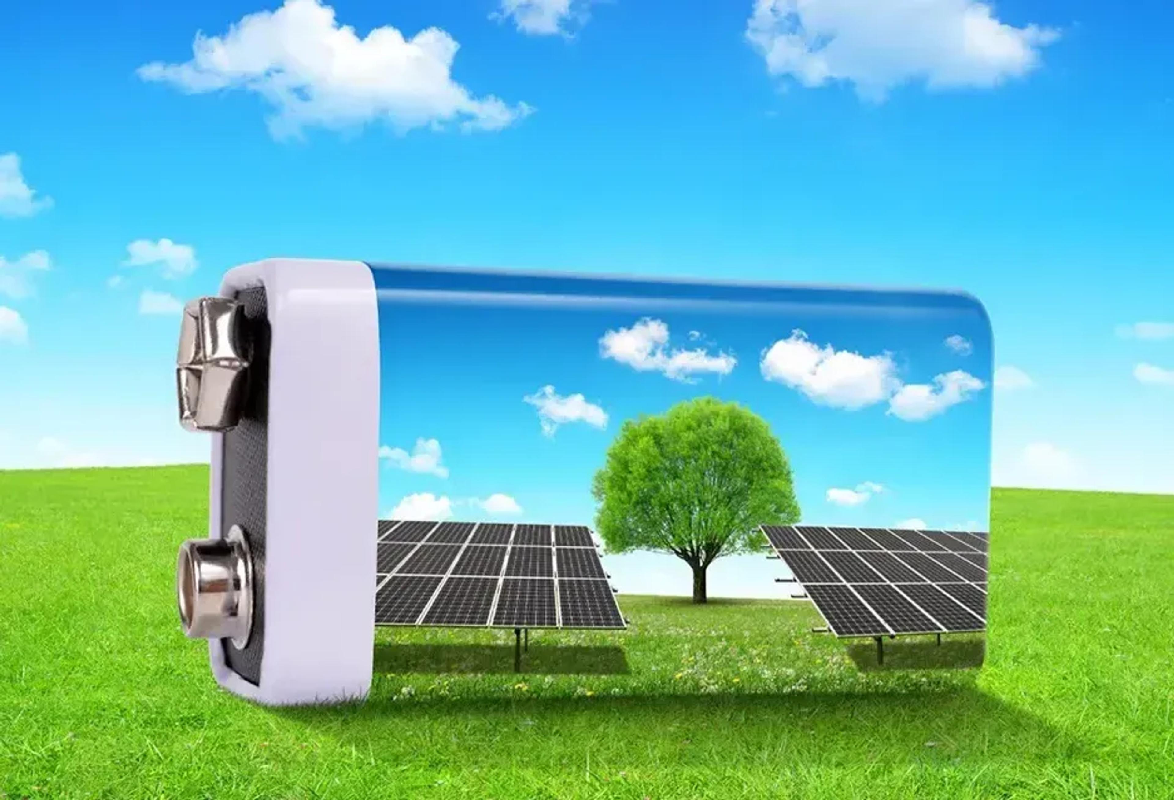 afbeelding van een batterij met zonnepanelen en een boom