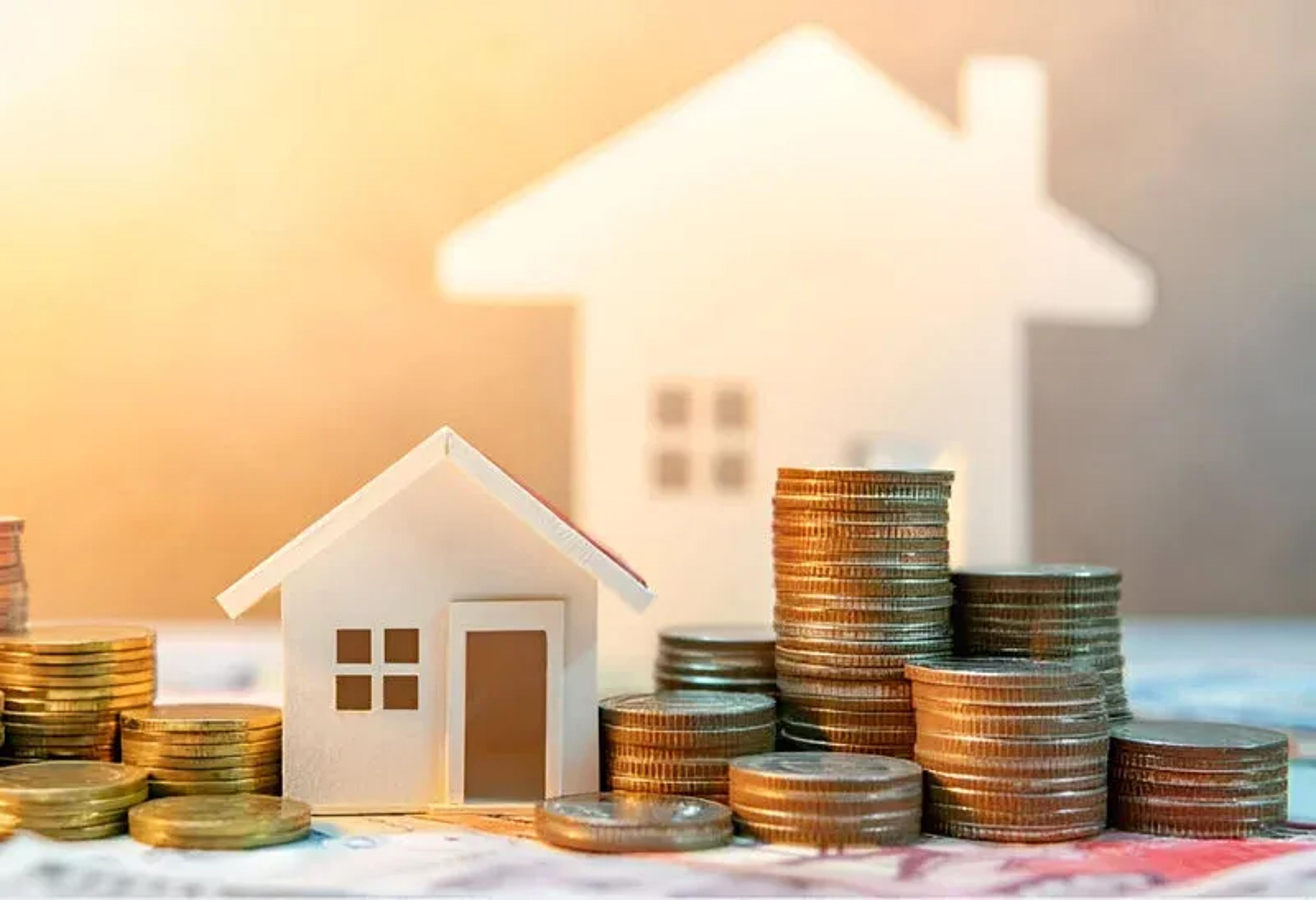 maison et pièces de monnaie