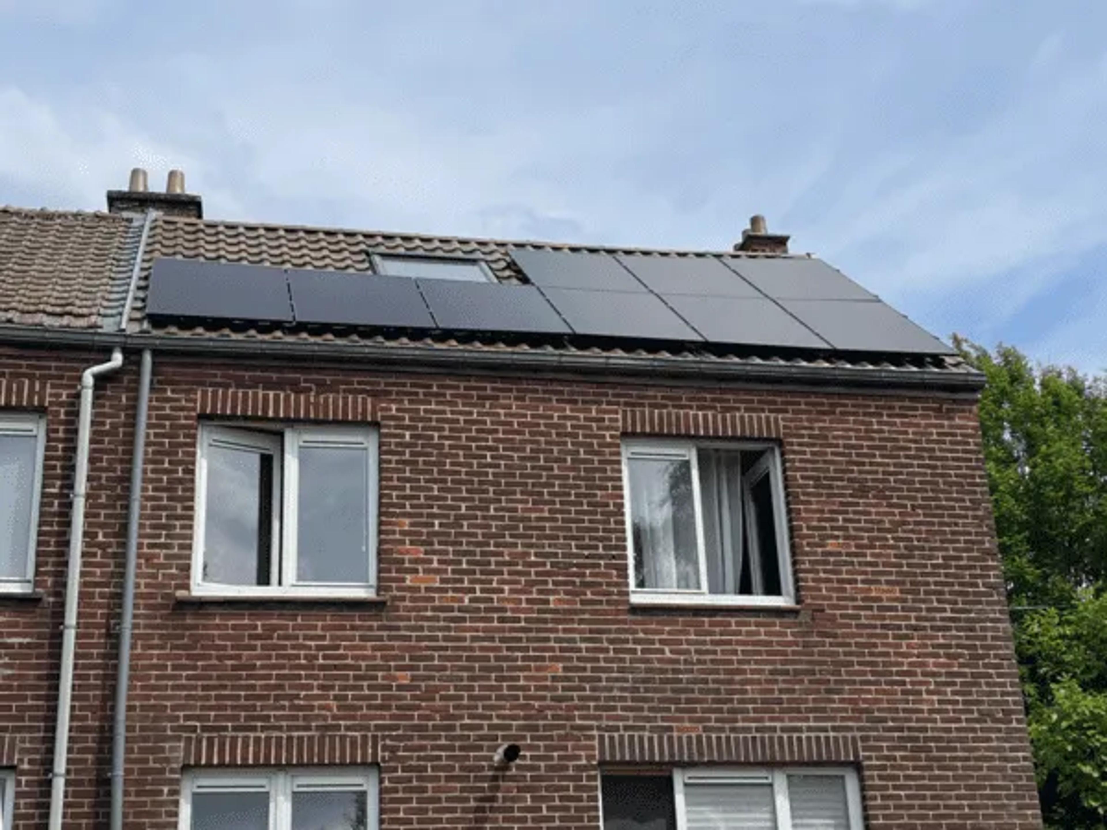 A house with solar panels installed on the roof