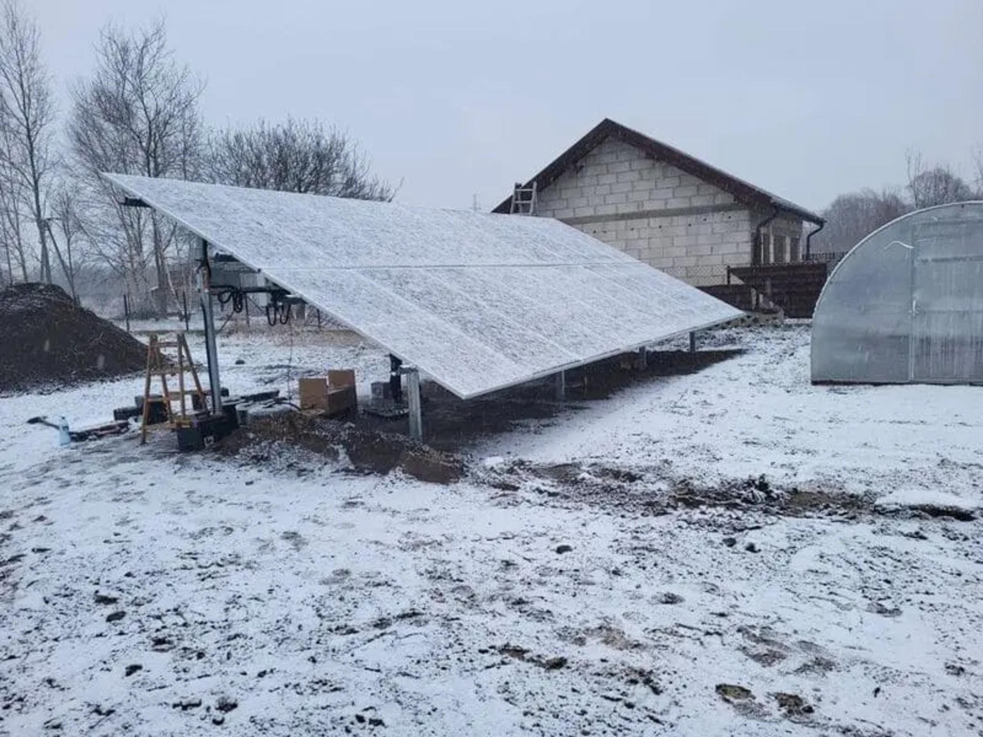 Solar panels covered in snow during the winter