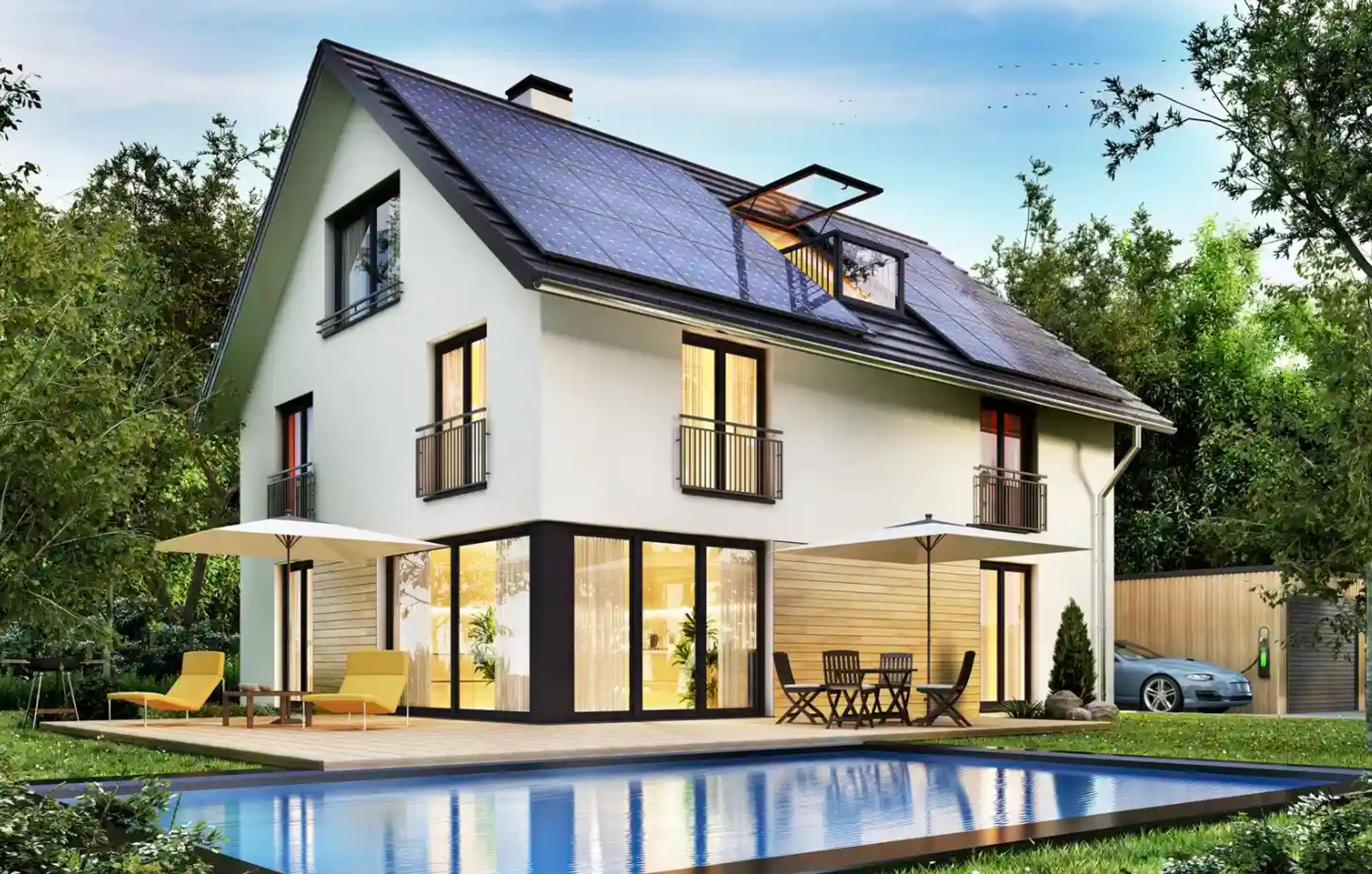Een nieuw huis met zonnepanelen en een laadpaal aan huis