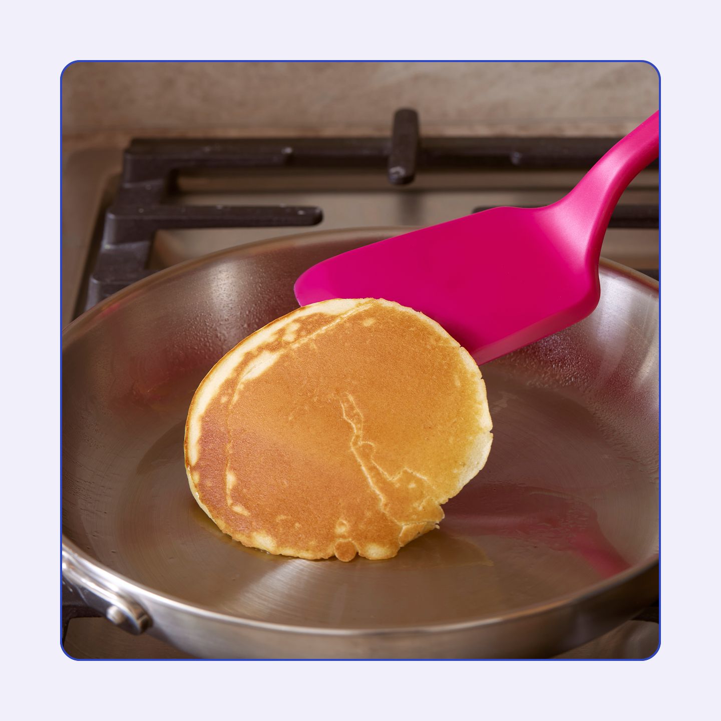 A Ruby Flip spatula turning a pancake.