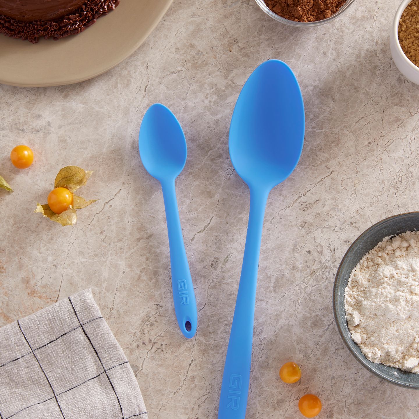 A close up of a Blue Topaz Spoon on a baking background.