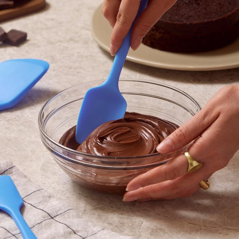 A spoonula in cake batter.