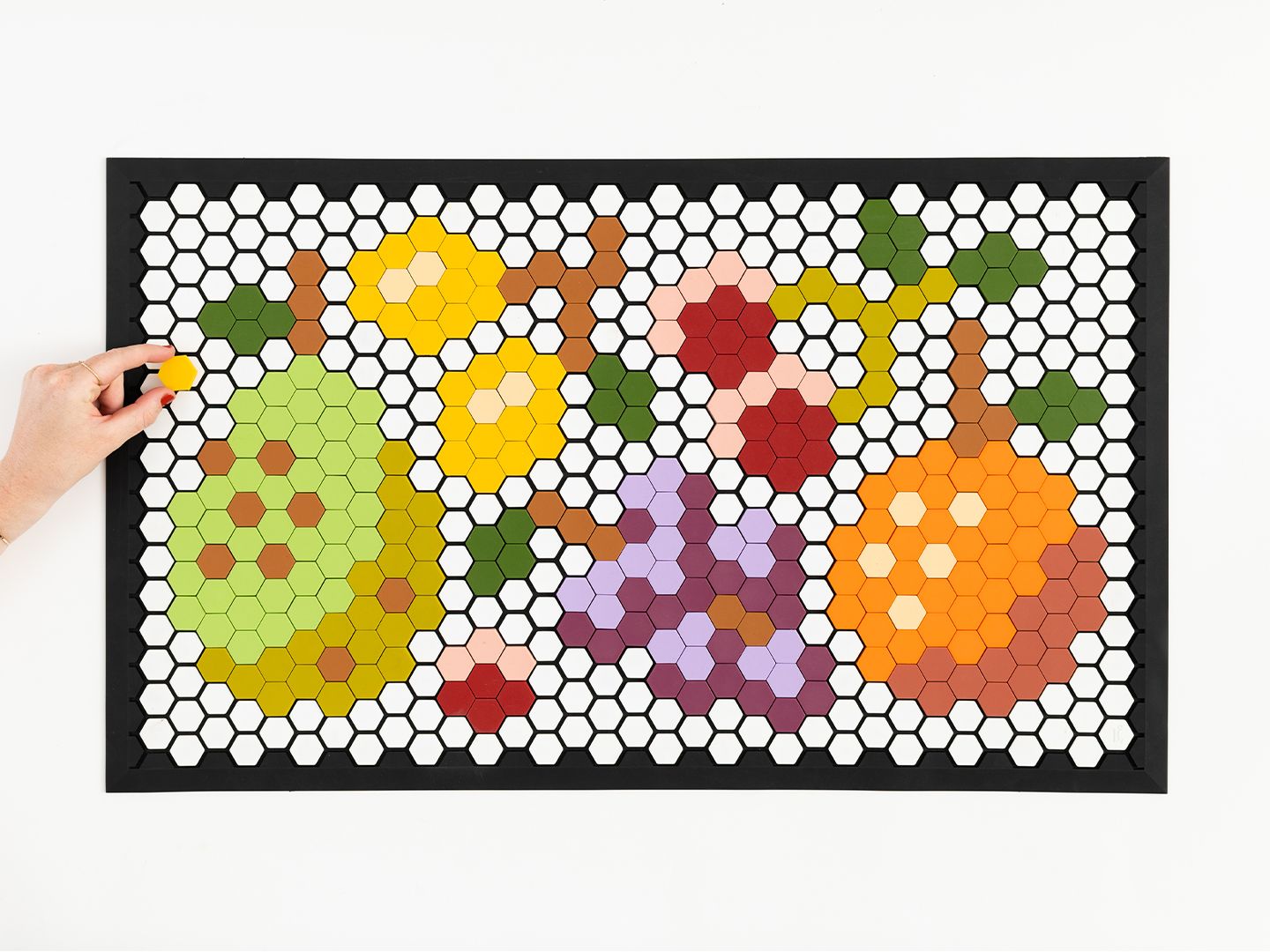 Tile mat with colorful fruit designs