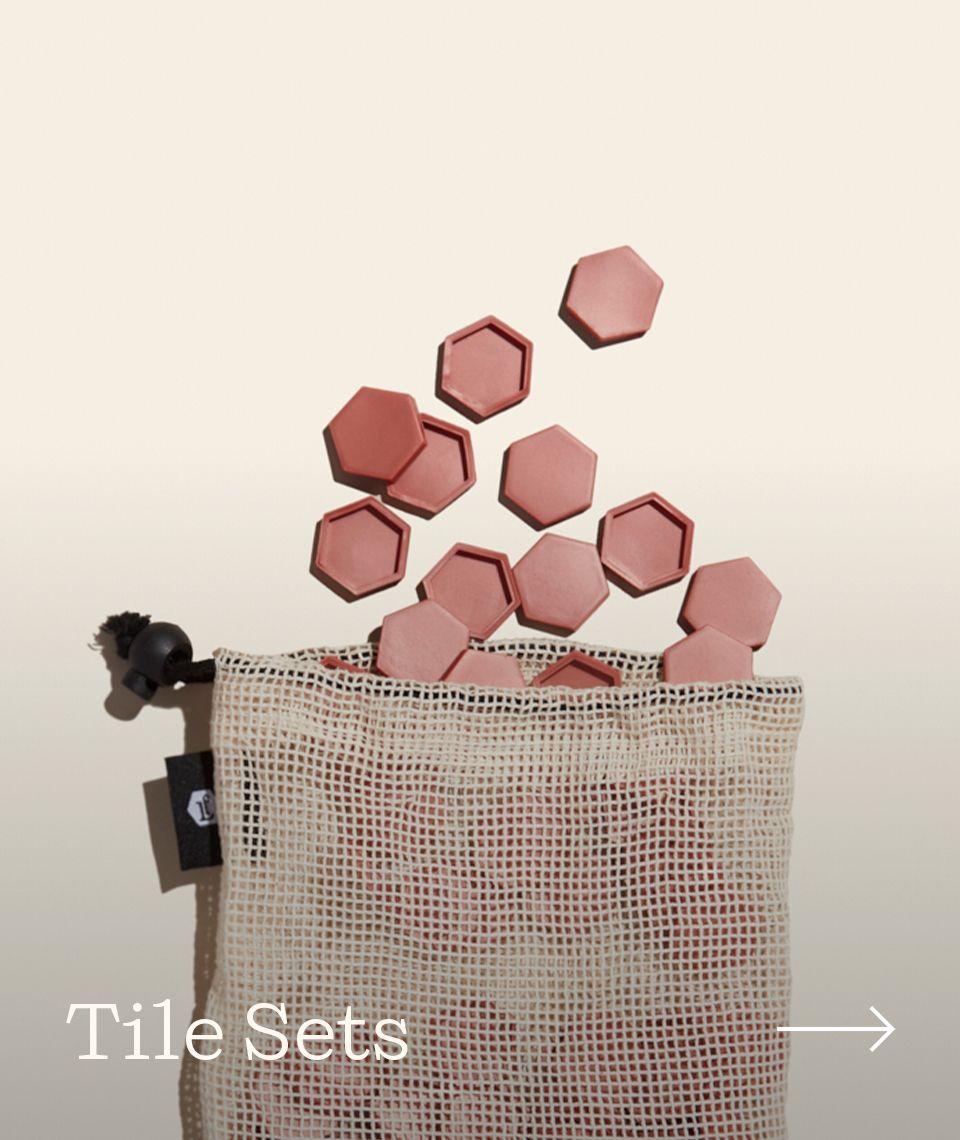 An up close shot of the rose gold tile sets.