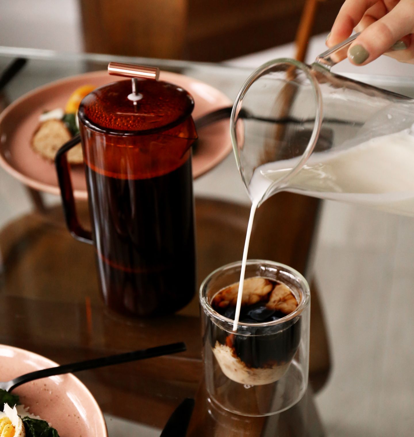 Yield french press in action on a kitchen table.