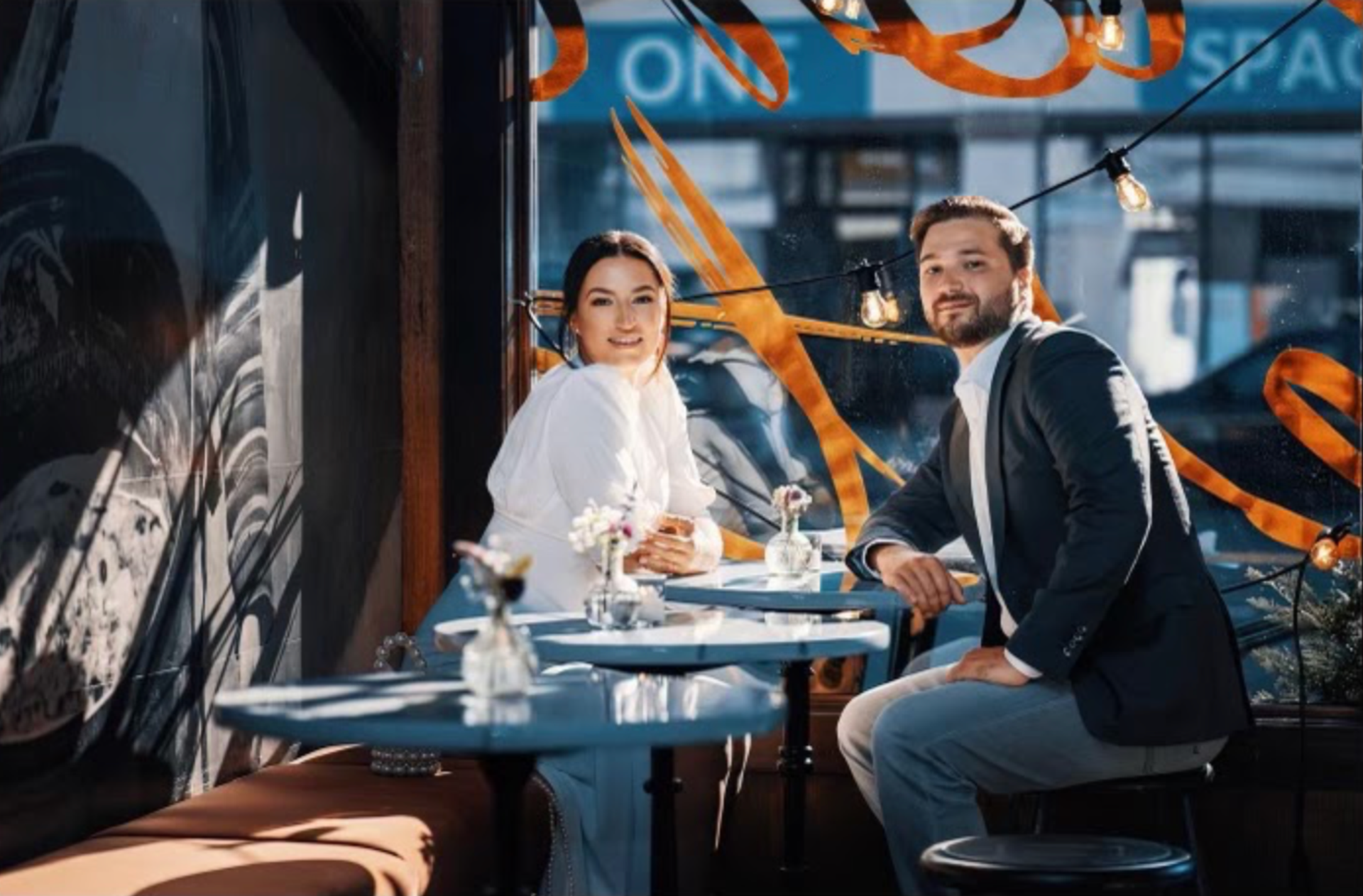 Photo of couple in Monk Room window